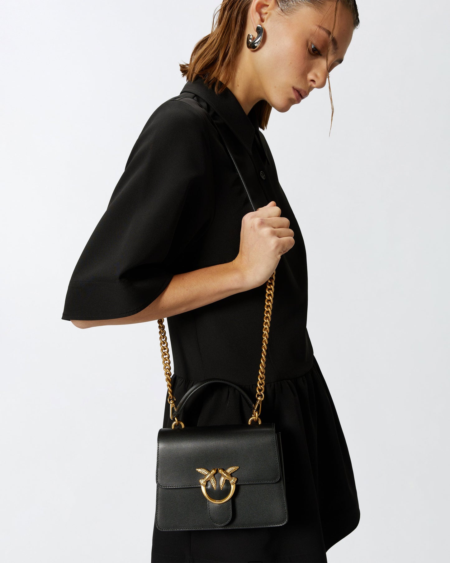 Mini handbag Love Bag Top Handle in leather