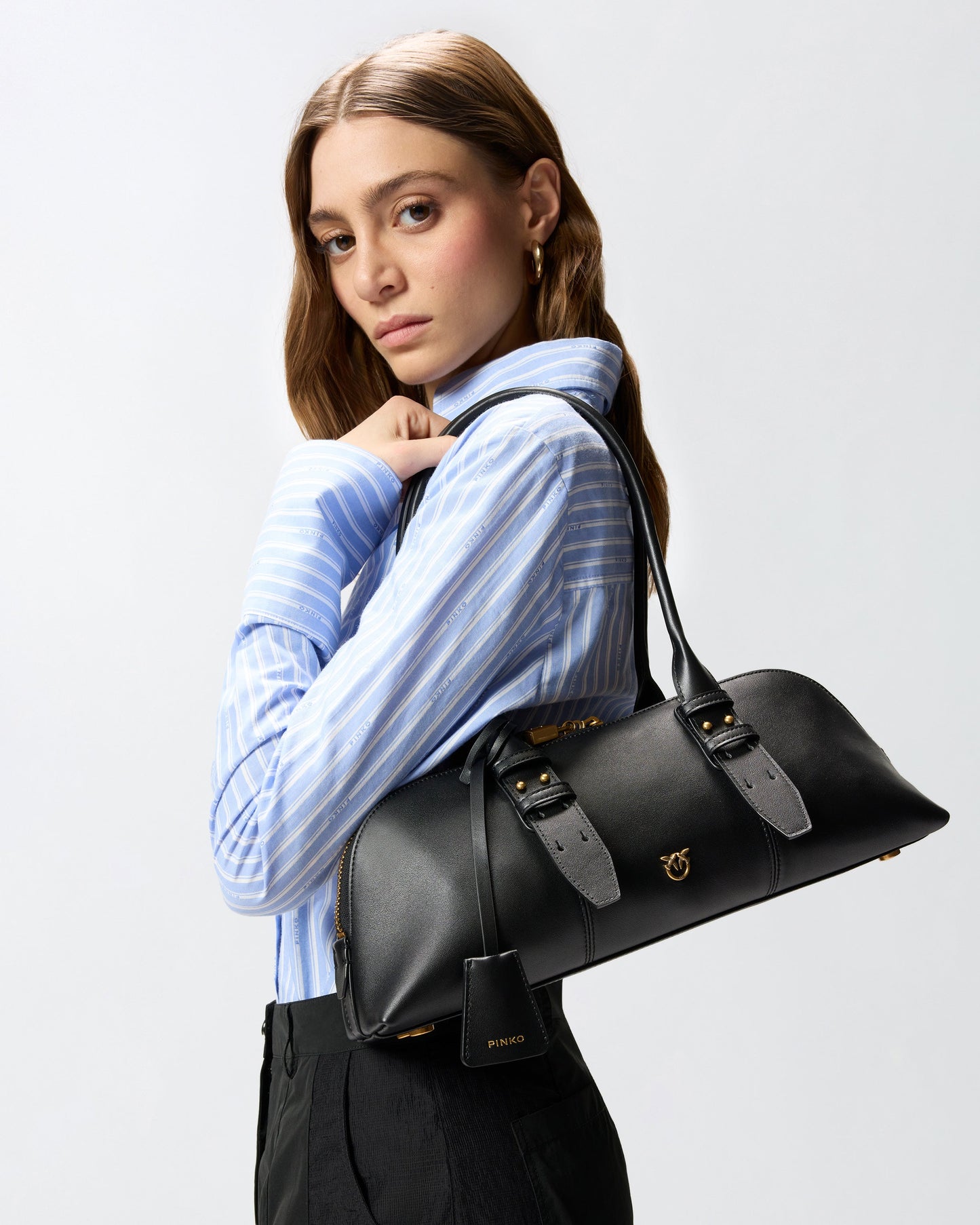 Escape Bag Horizontal large shoulder bag in leather