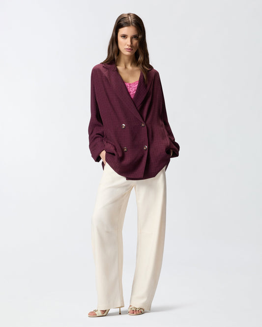 Double-breasted jacket with tie motif