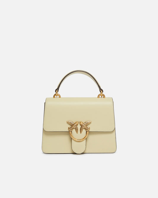 Mini handbag Love Bag Top Handle in leather