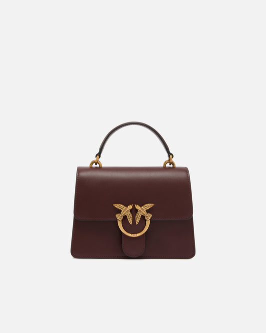 Mini handbag Love Bag Top Handle in leather