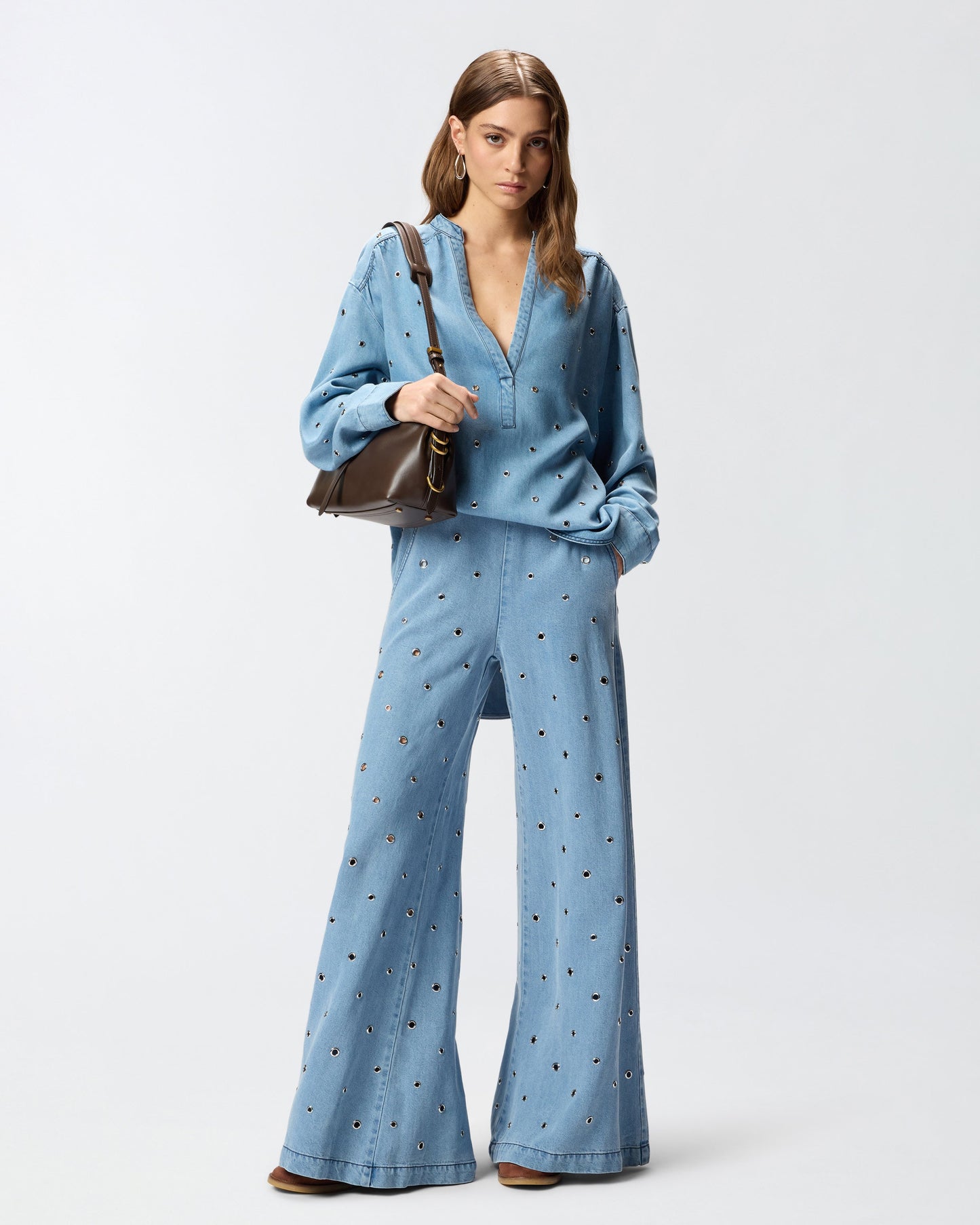 Denim blouse with eyelets