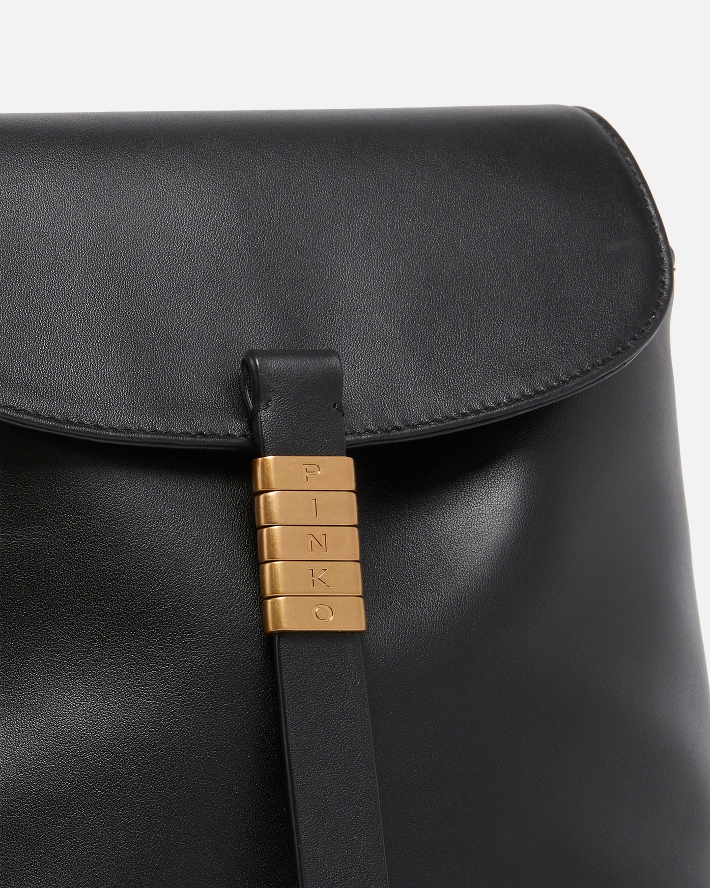 Medium Saddle Backpack in leather with logo rings