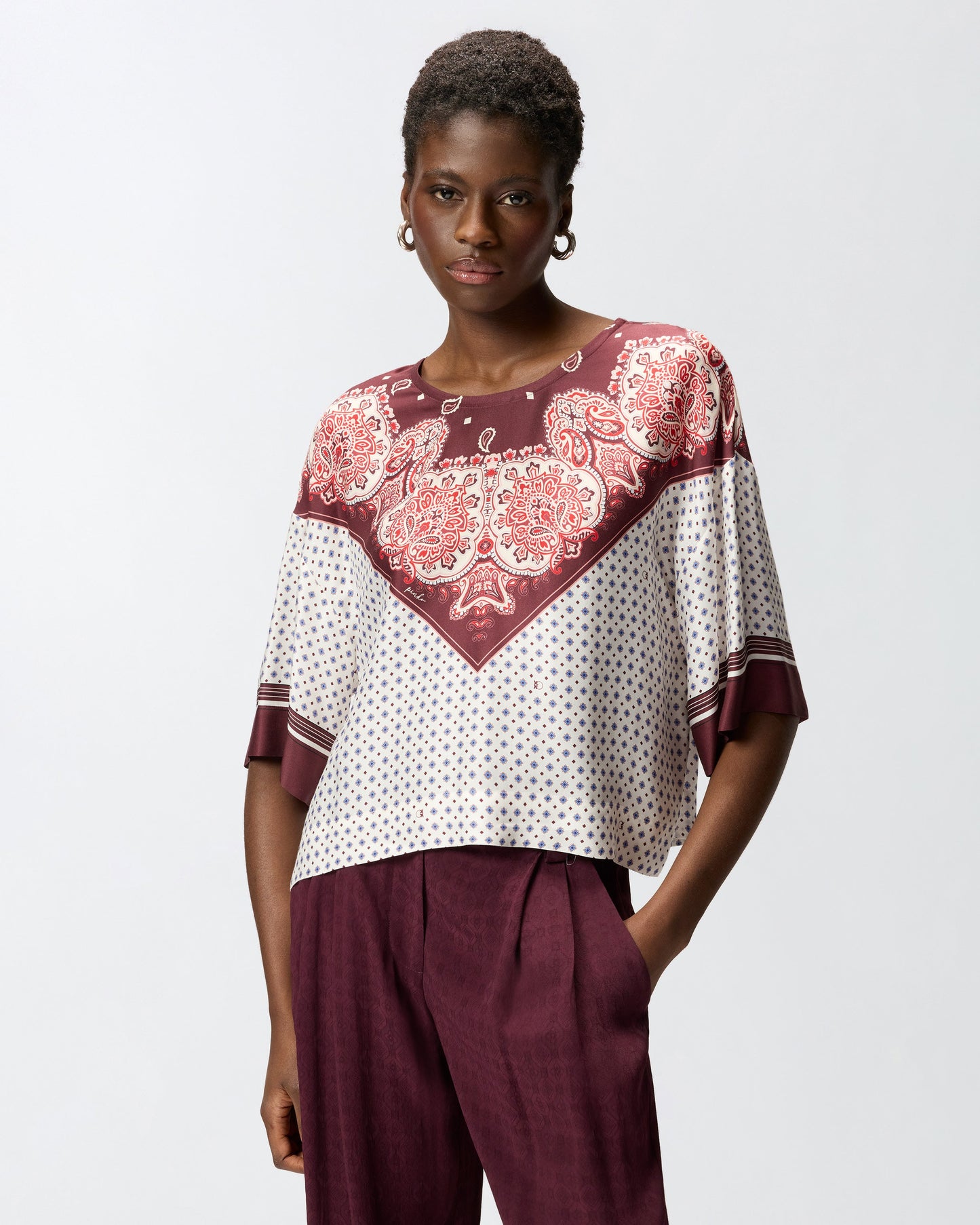 Blouse with tie motif and placed print