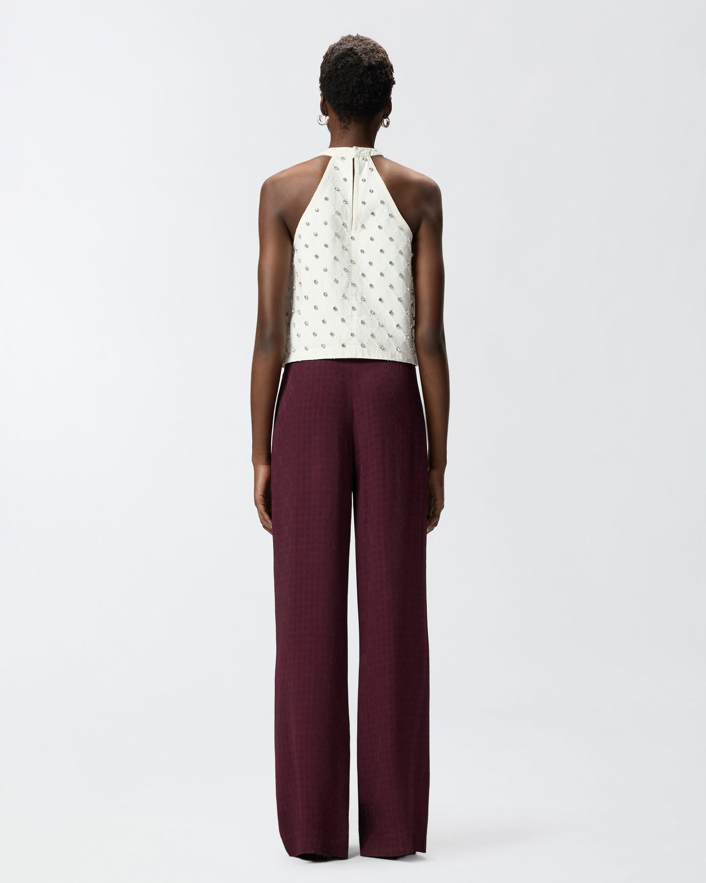 Trousers in jacquard with tie motif