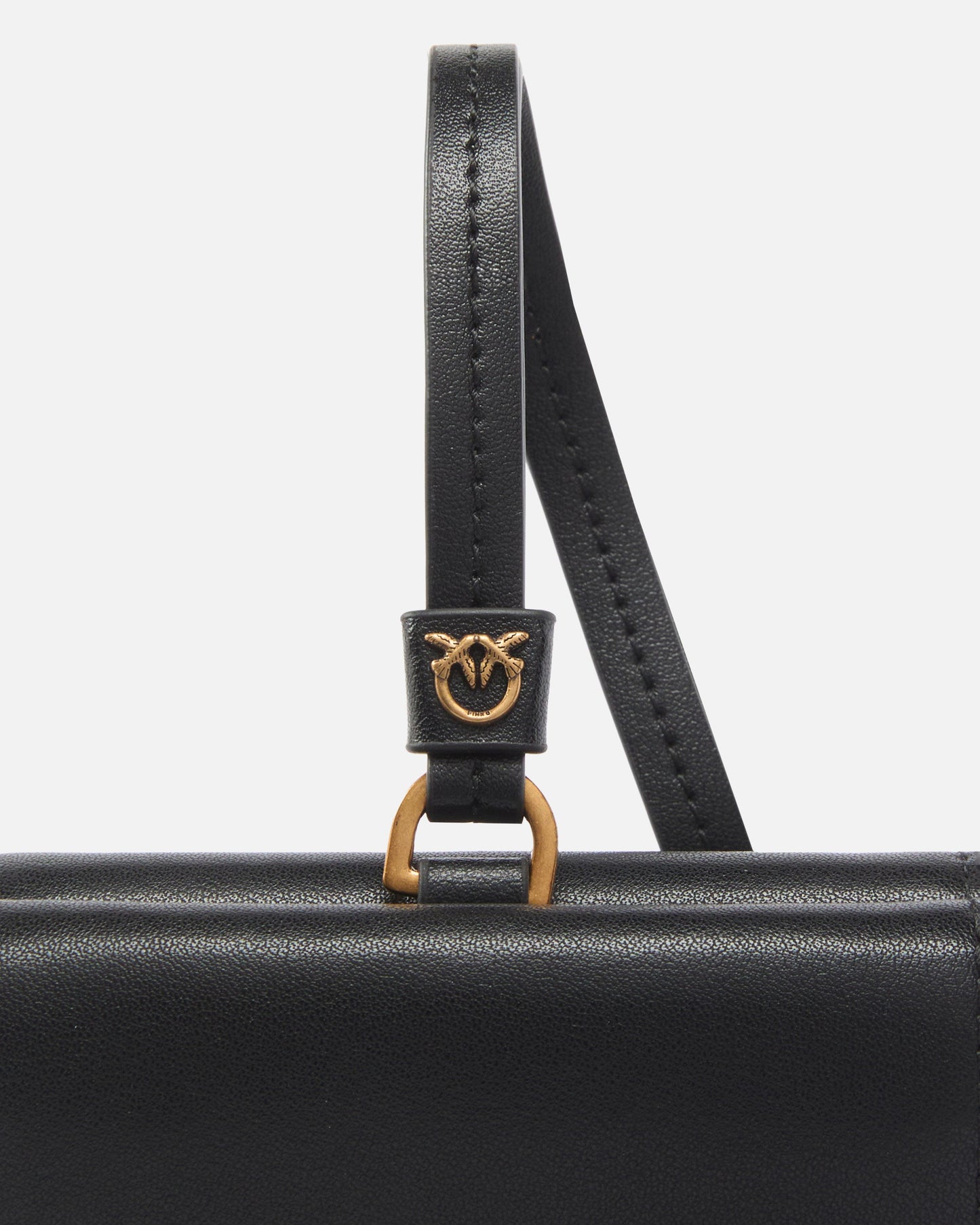 Compact leather wallet with wristlet