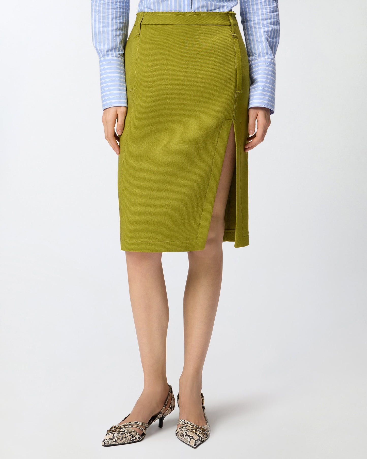 Slim-fitting calf-length skirt with slit