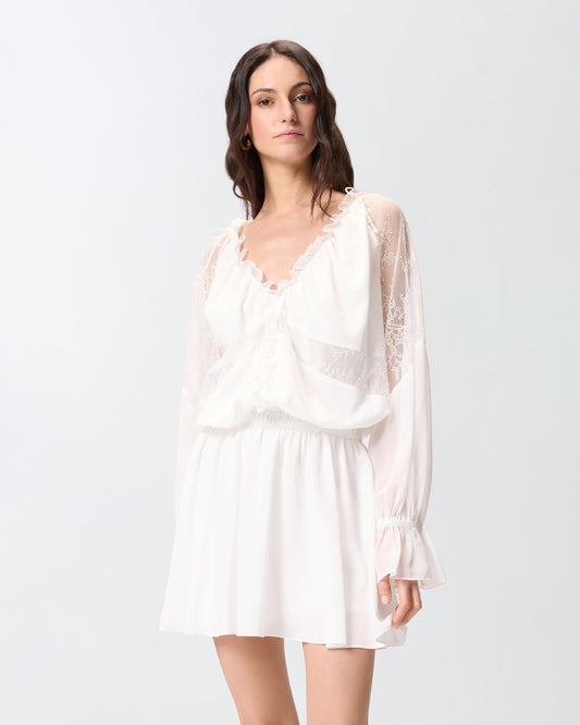 Mini dress with long sleeves and lace details