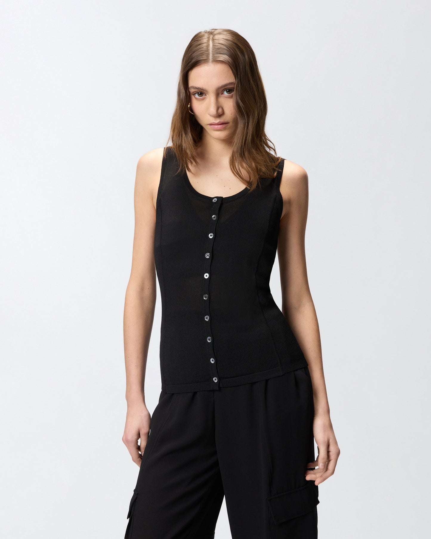 Knitted vest top with mother-of-pearl buttons