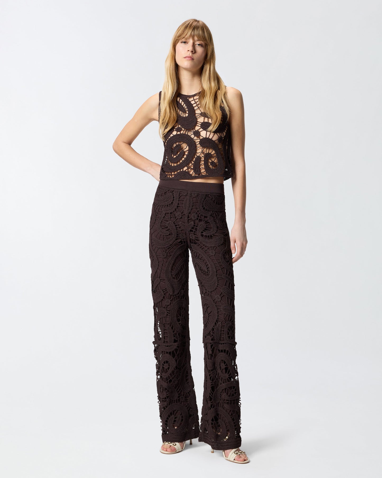 Geometric crocheted trousers
