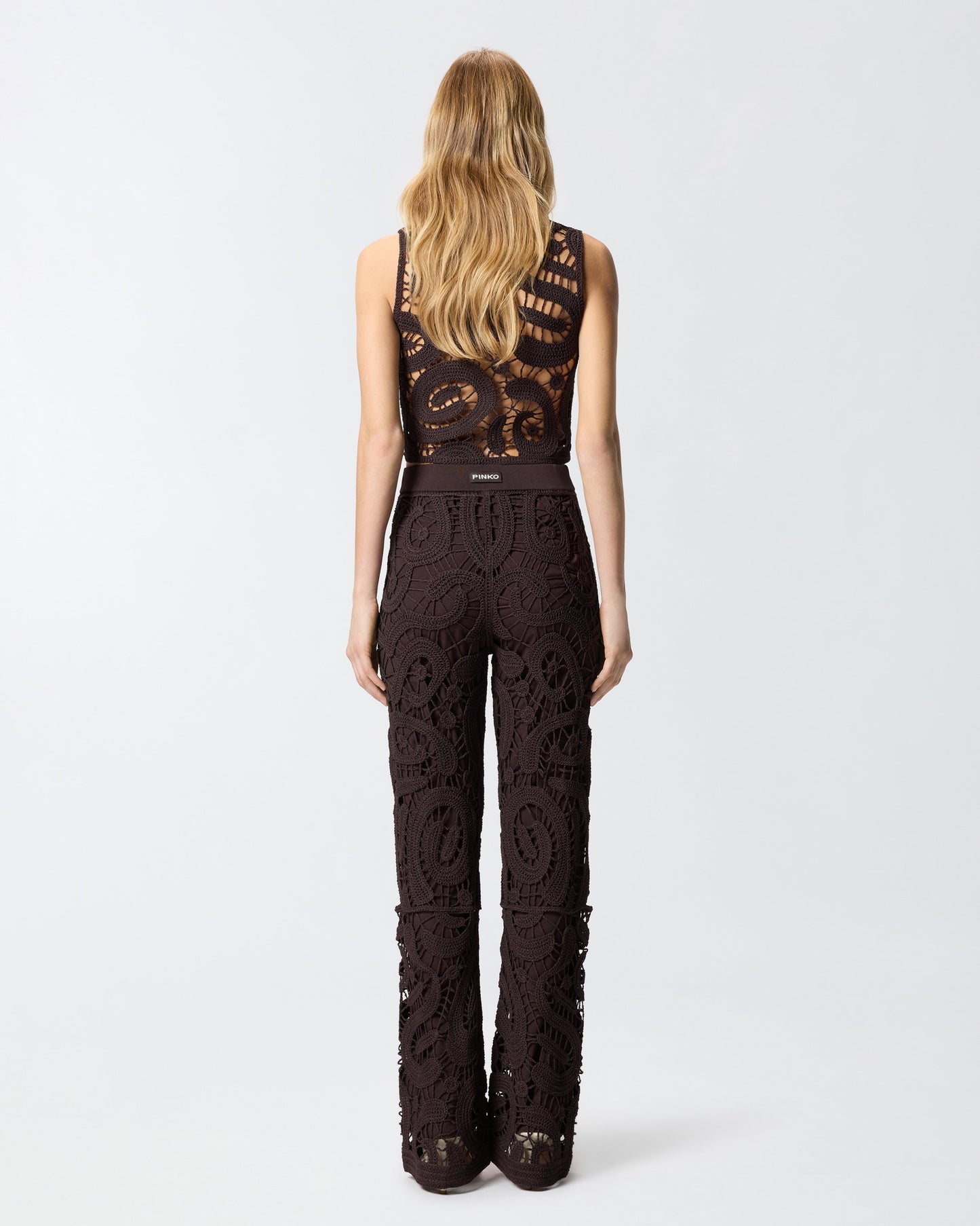 Geometric crocheted trousers