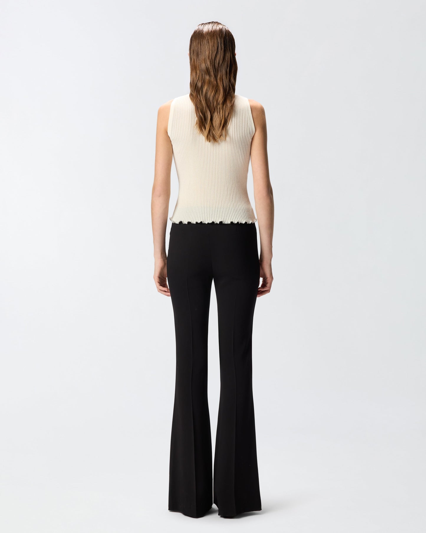 Flared trousers with pressed pleat detail