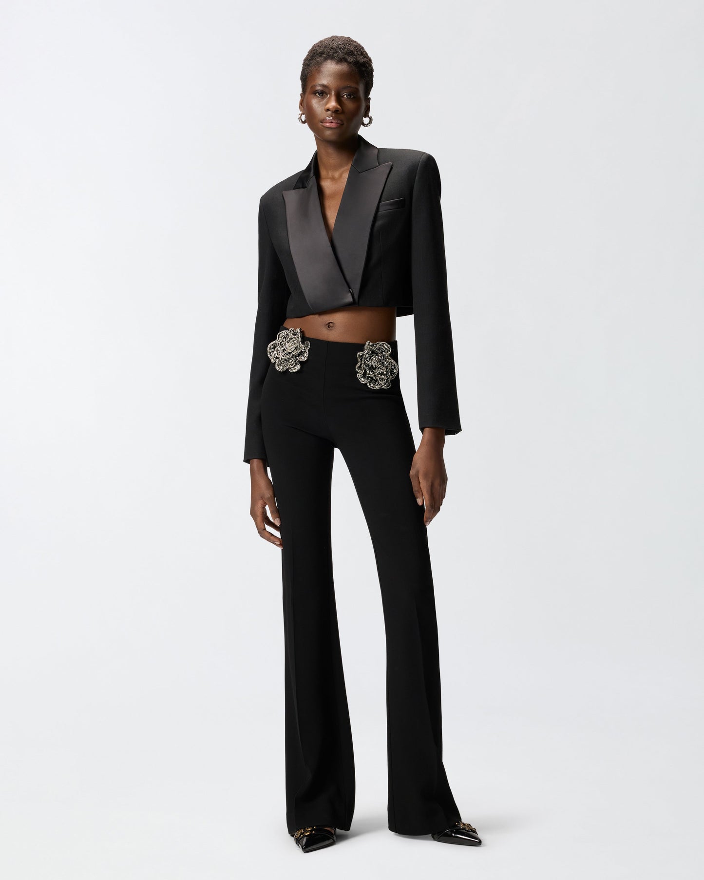 Trousers with embroidered jewel roses
