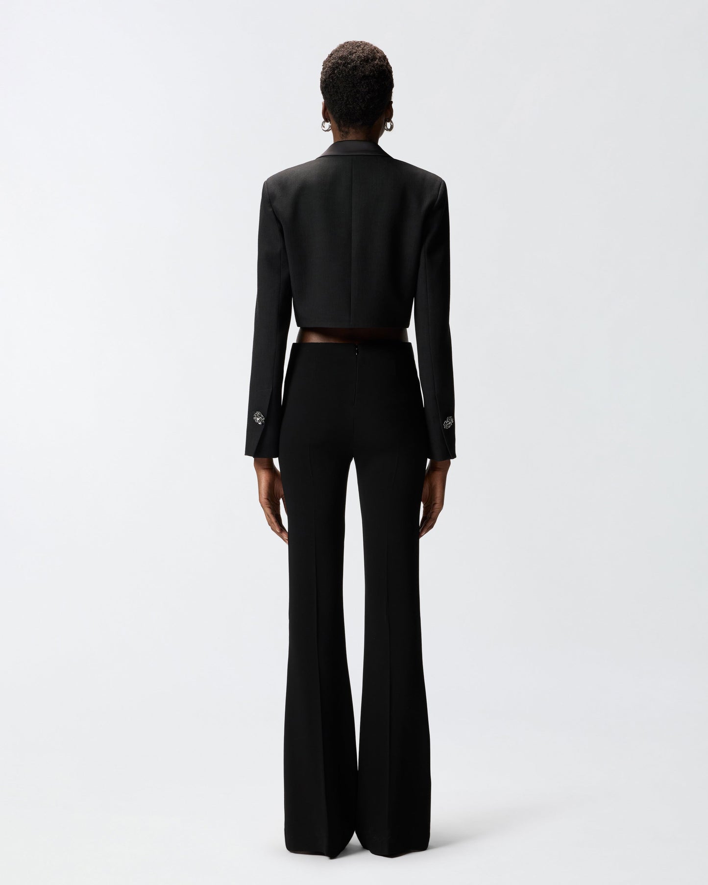 Trousers with embroidered jewel roses