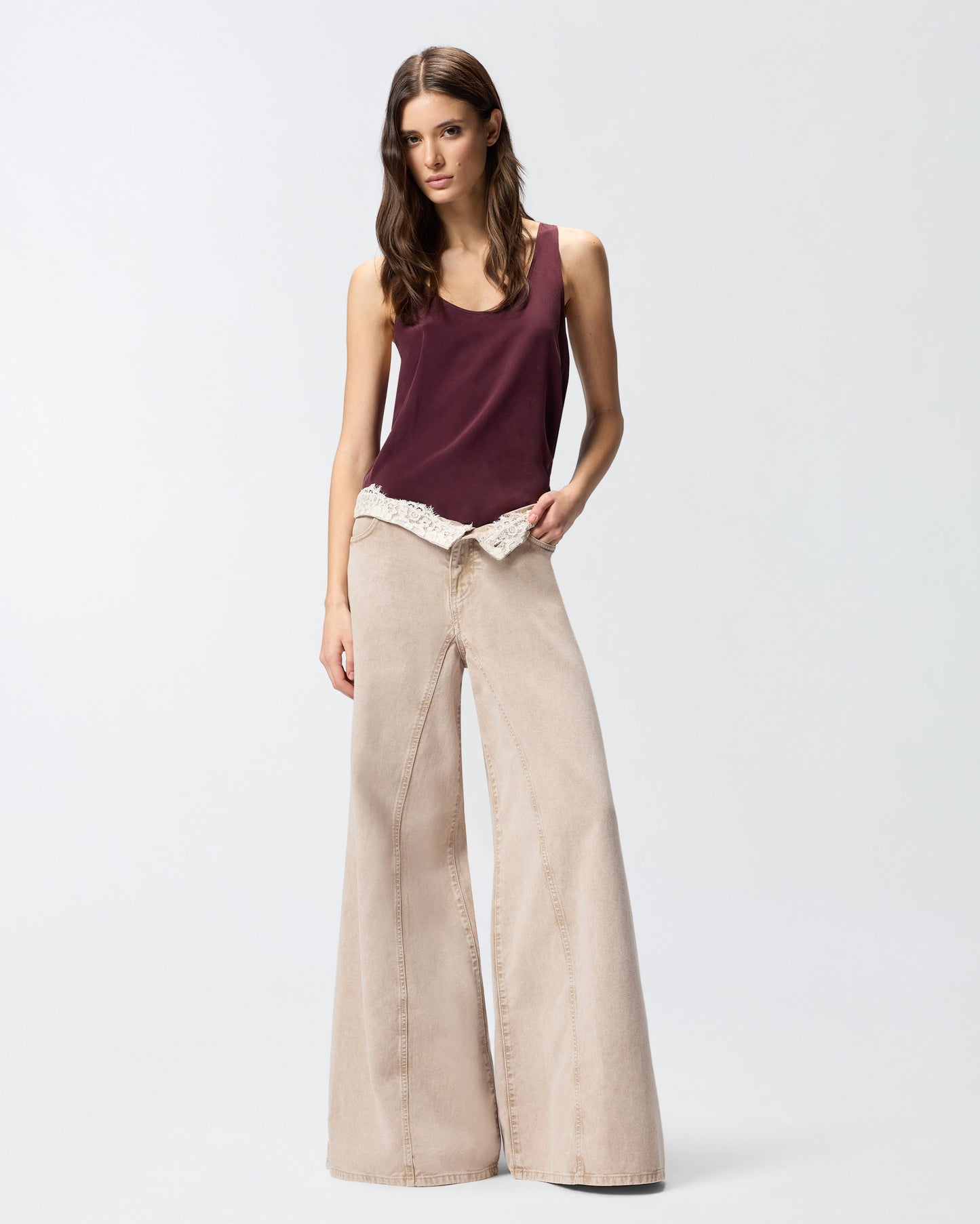Brown jeans with lace at the waist