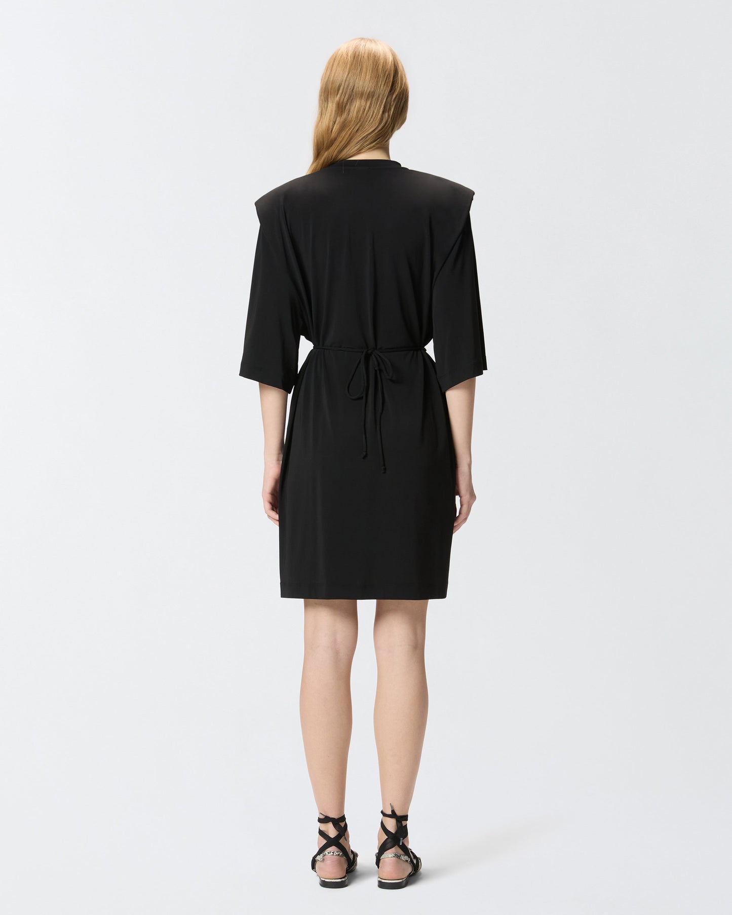 Mini dress with structured shoulders and chain