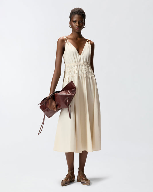 Sleeveless midi dress with pleats and gathering