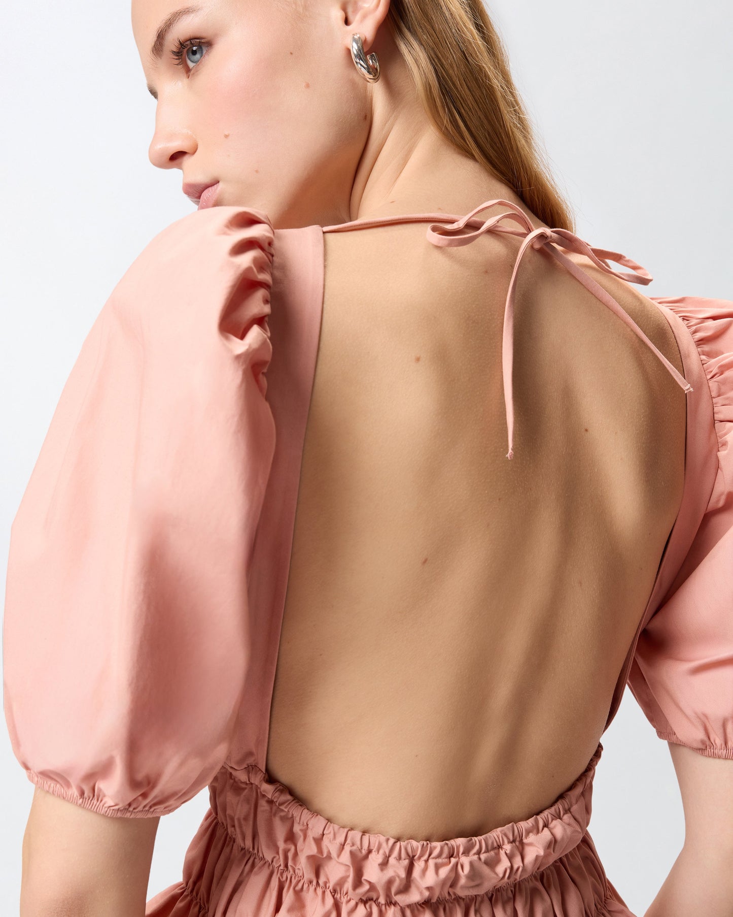 Cropped top with ruffles and open back