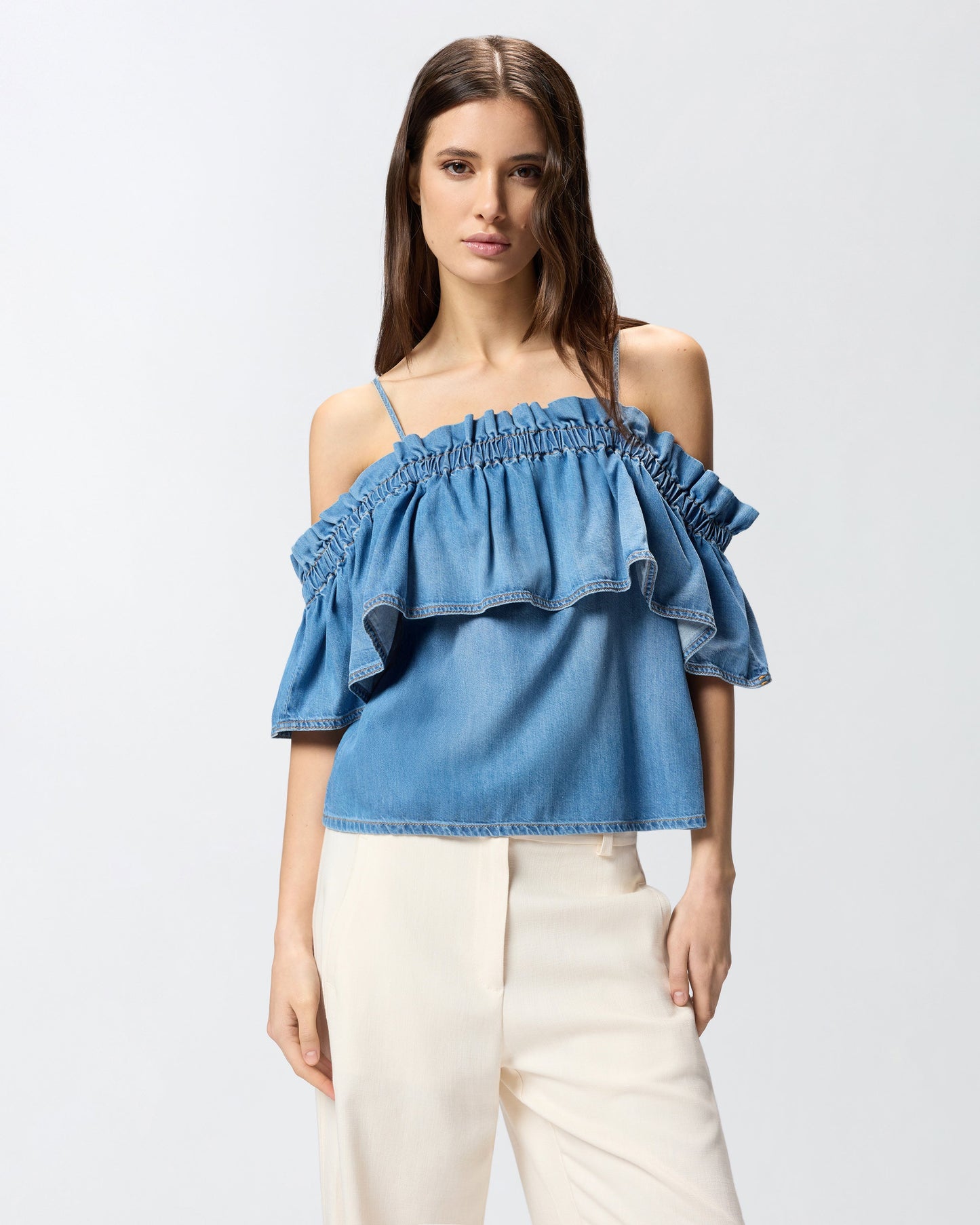 Denim top with ruffle and open shoulders
