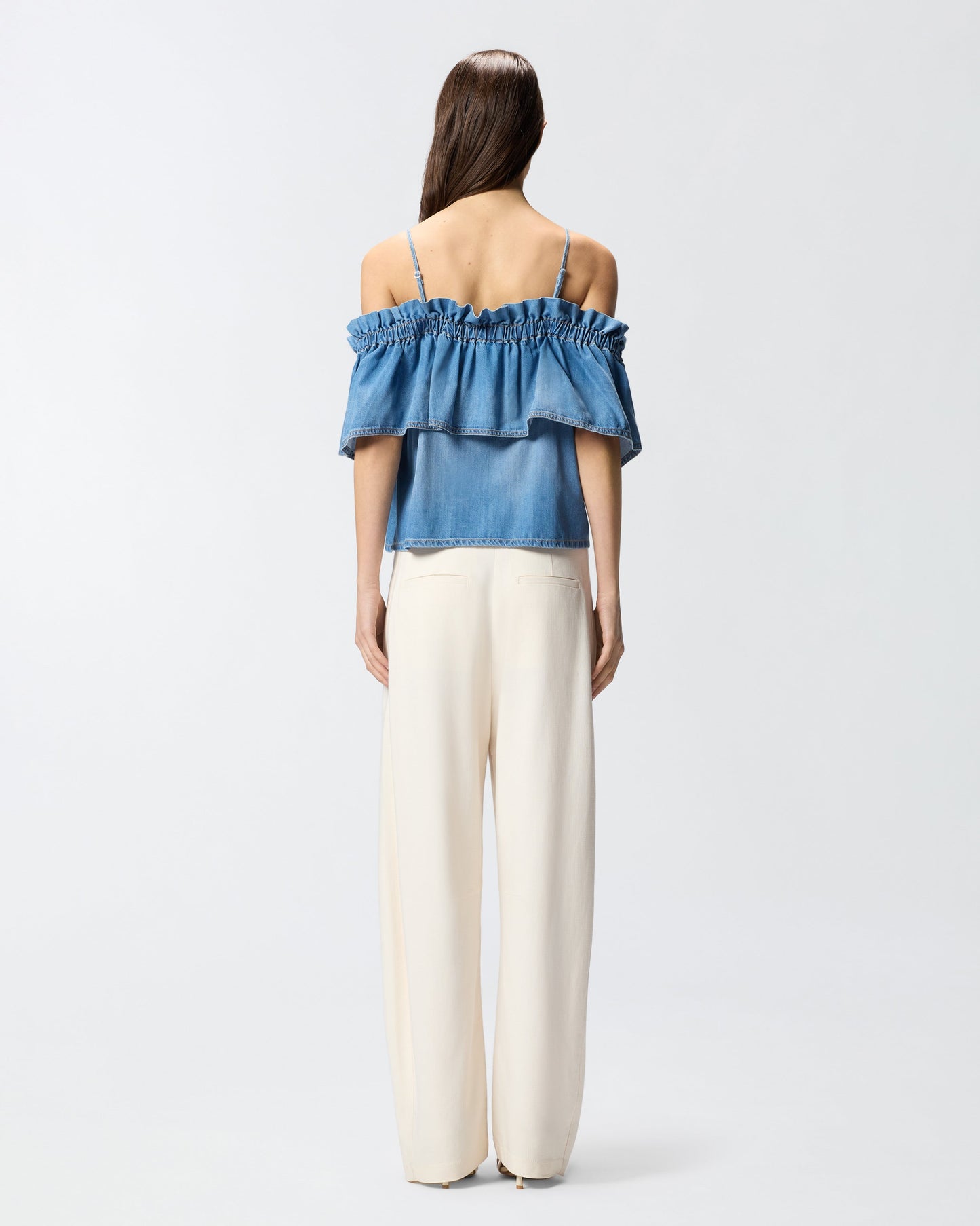 Denim top with ruffle and open shoulders