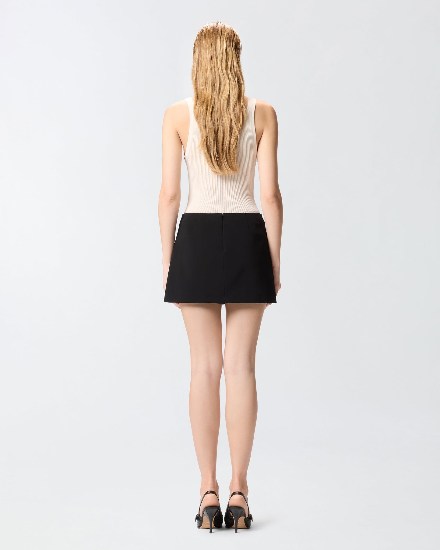 Mini skirt with embroidered jewel rose