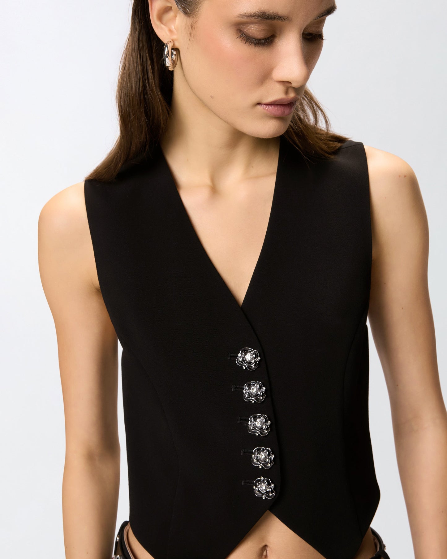 Vest with rose jewel buttons
