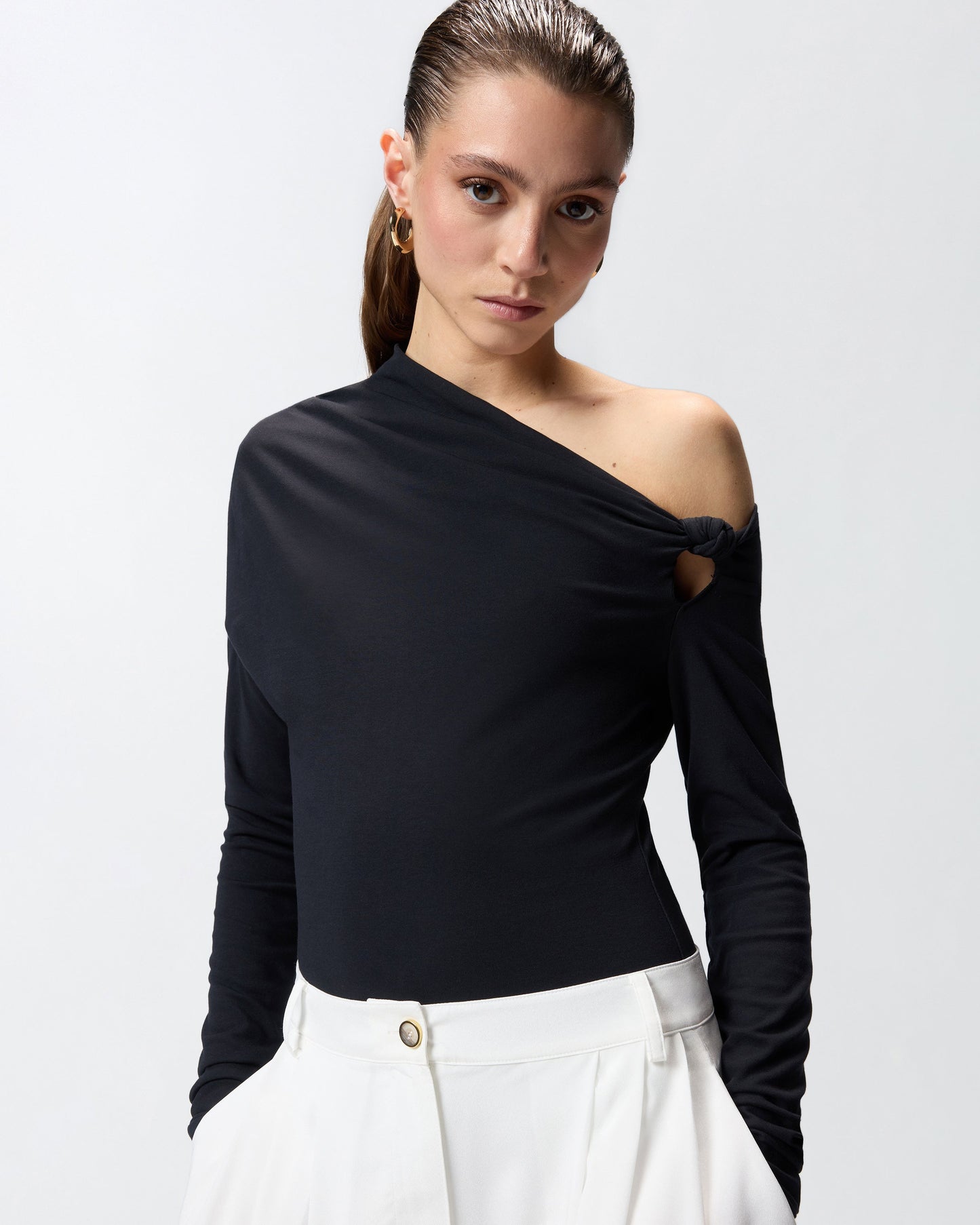 Bodysuit with asymmetric neckline