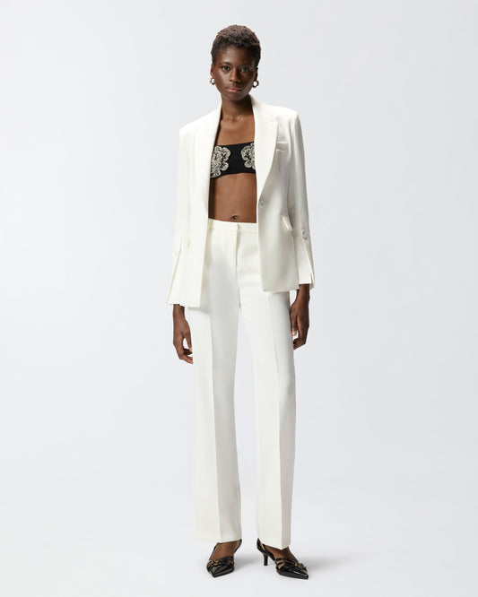 Trousers in canvas with pressed pleat detail