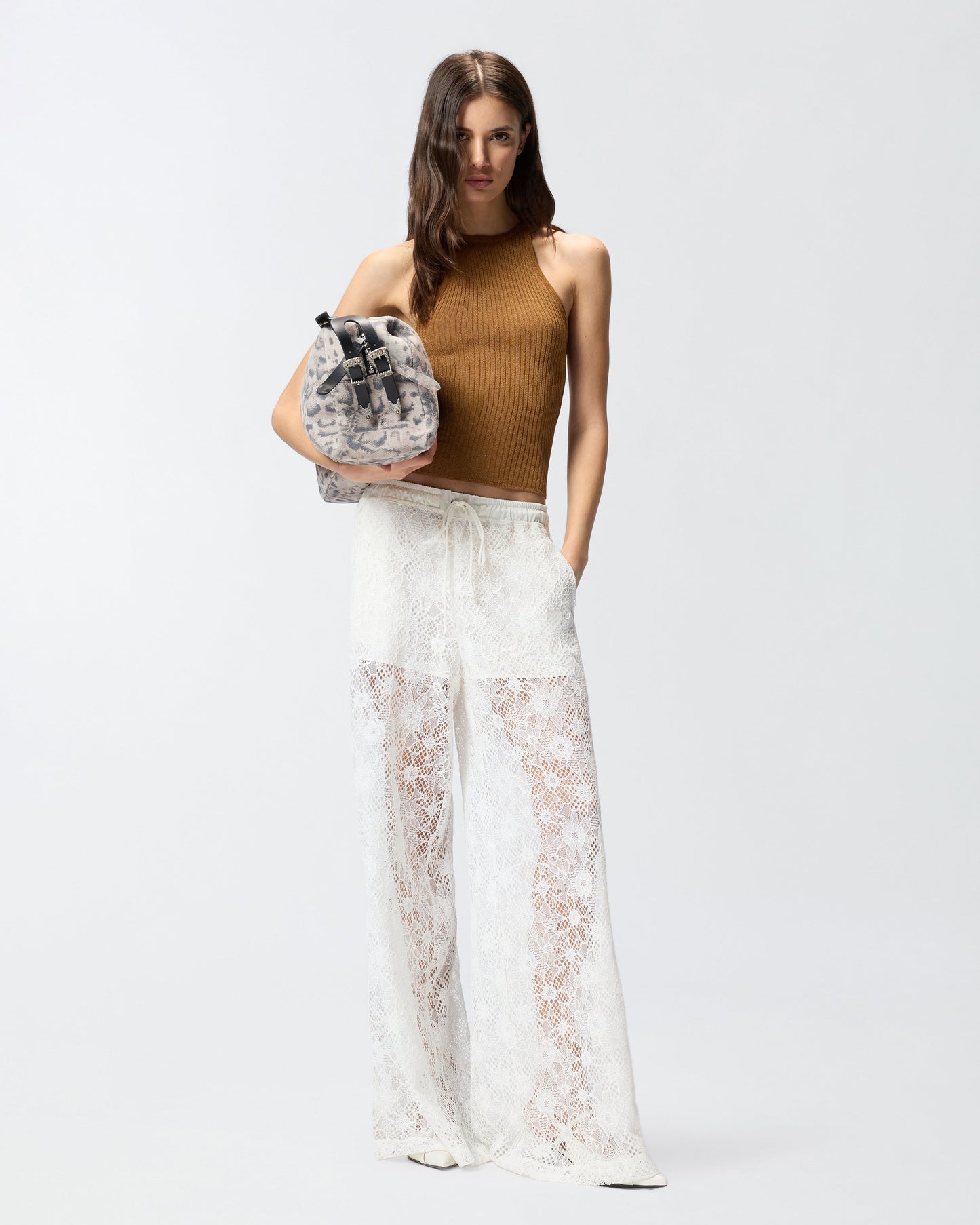 Trousers in floral embroidered lace