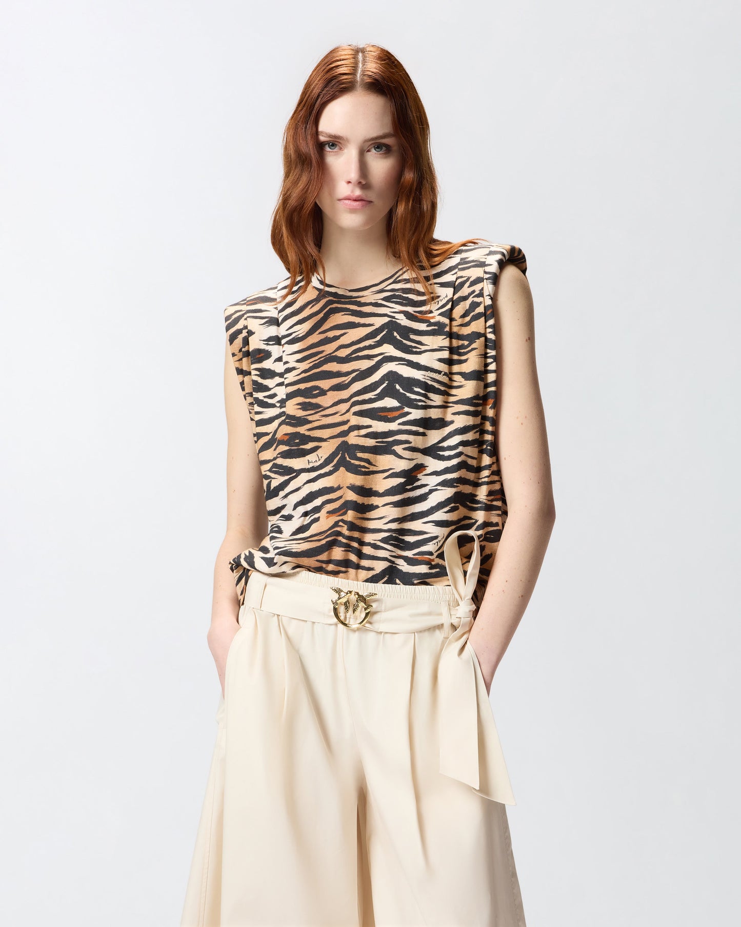 Sleeveless sweater with tiger print