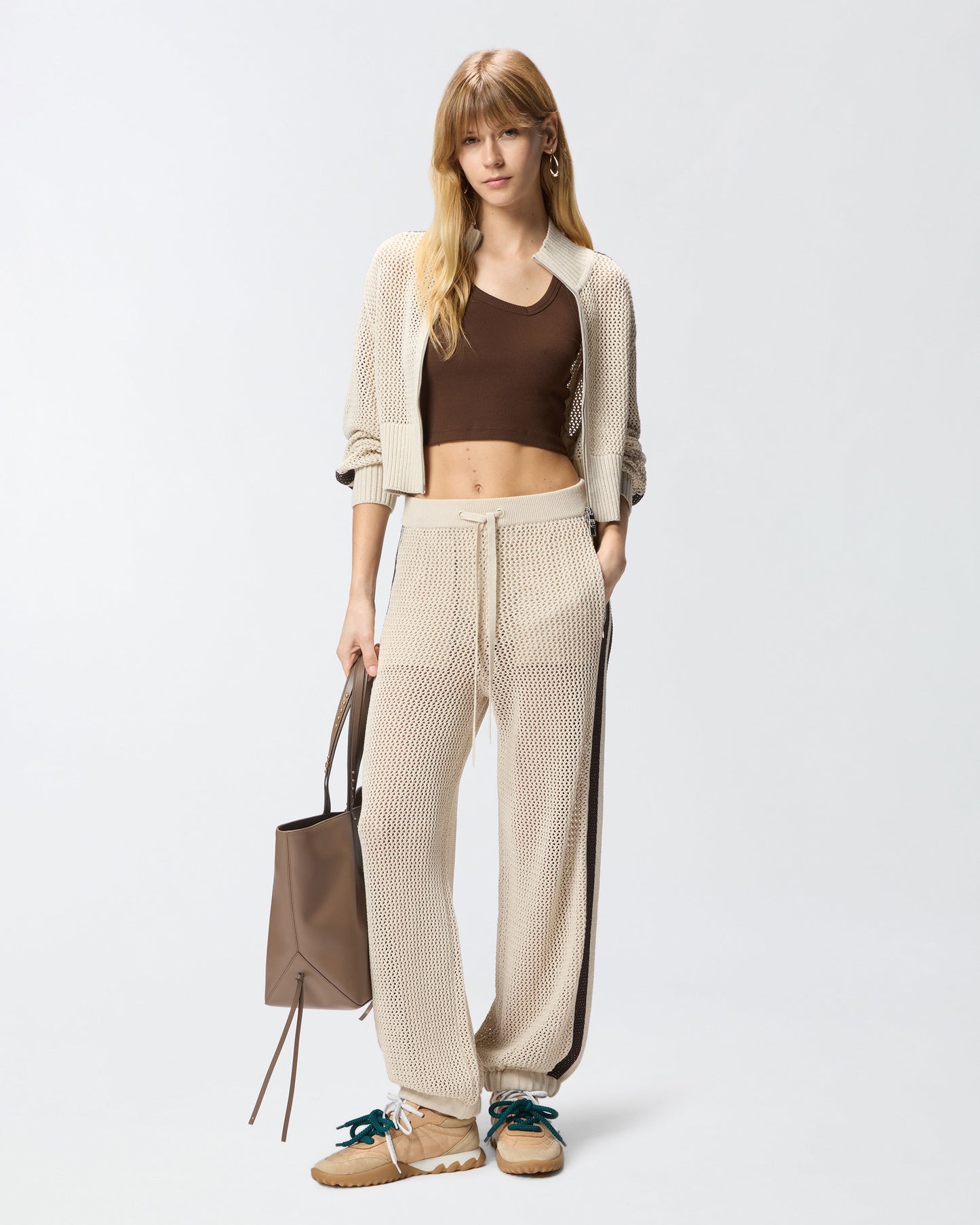 Openwork trousers with contrasting bands