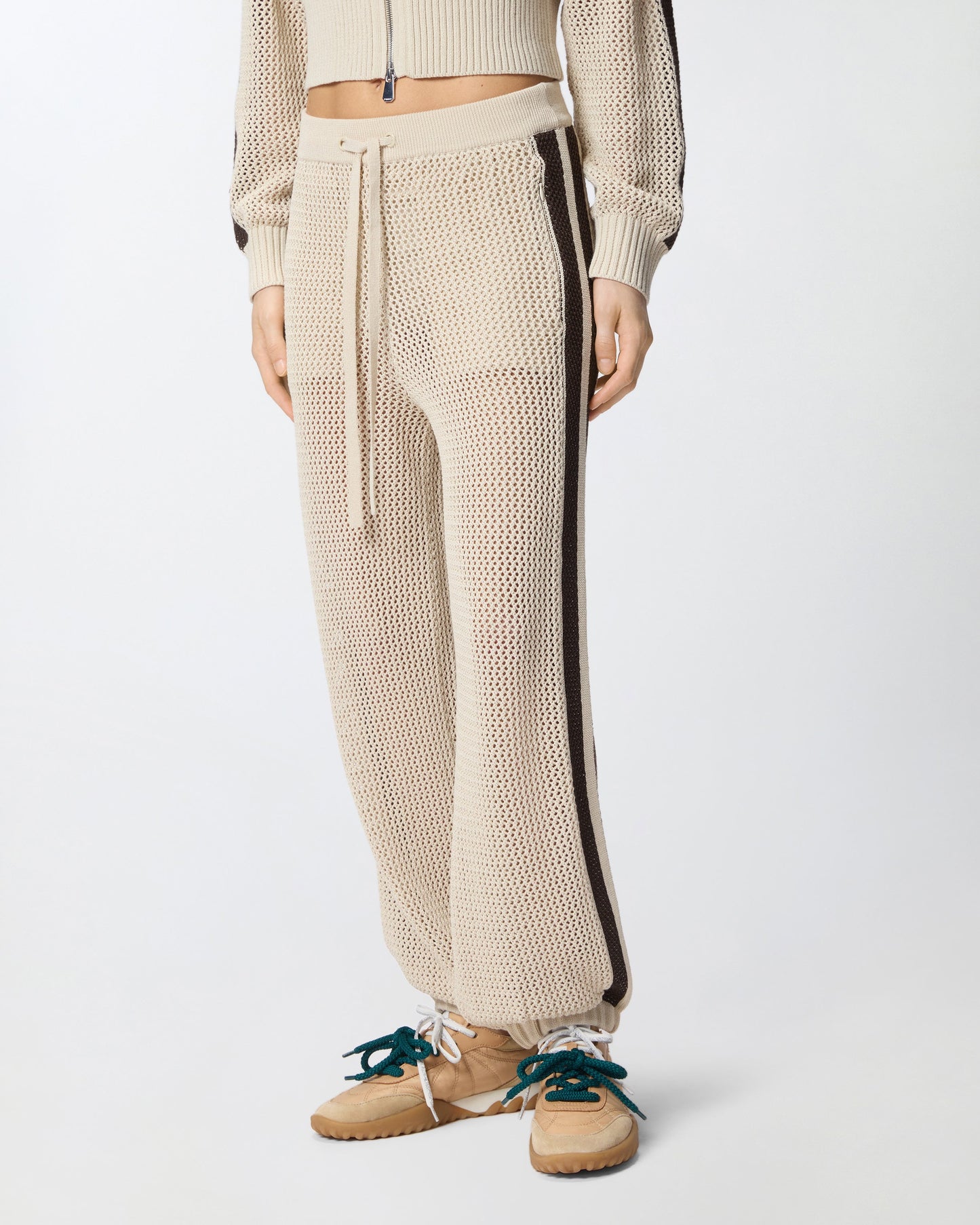 Openwork trousers with contrasting bands