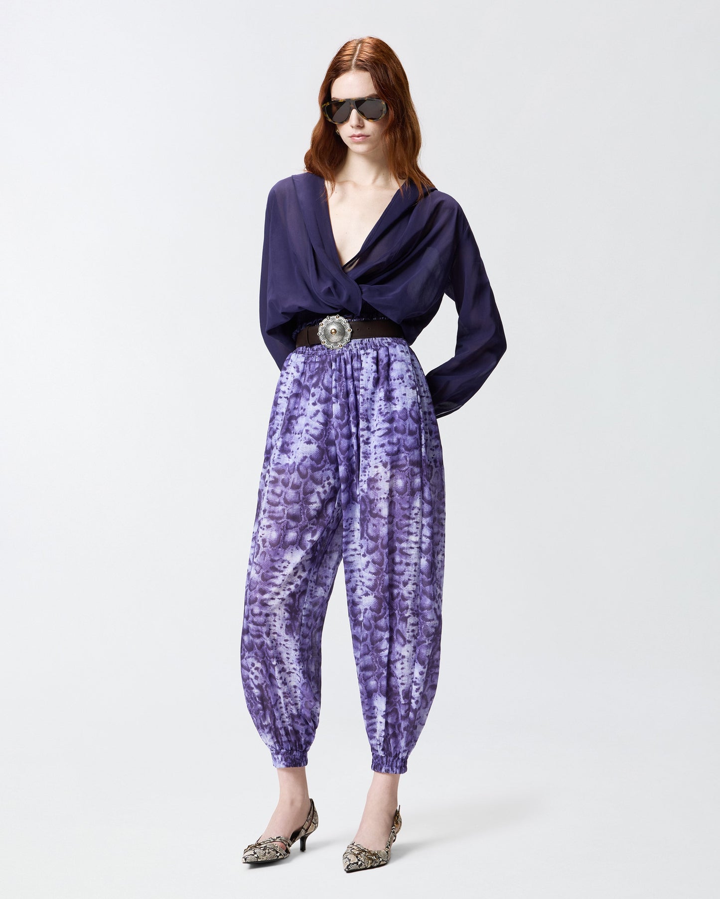 Cropped blouse with hood and sheer details