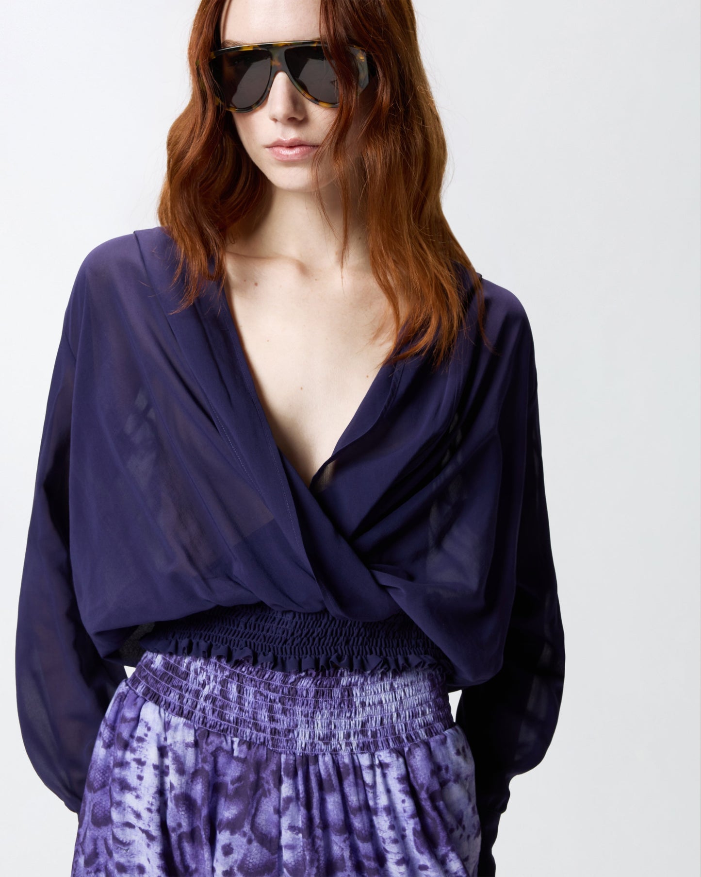 Cropped blouse with hood and sheer details