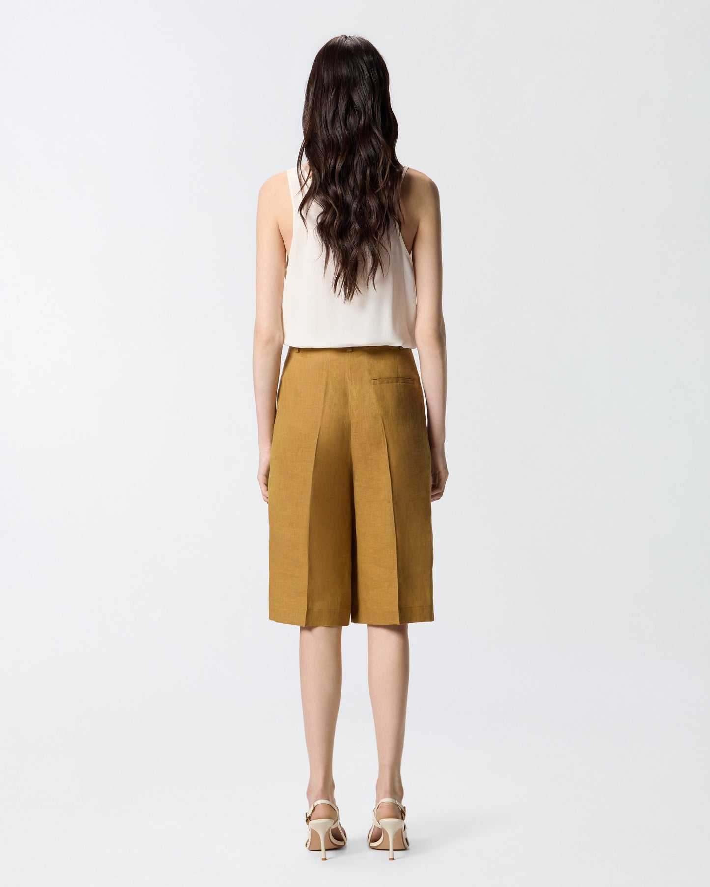 Linen Bermuda shorts with pressed pleat detail