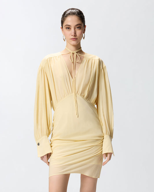 Mini dress with long sleeves and draping