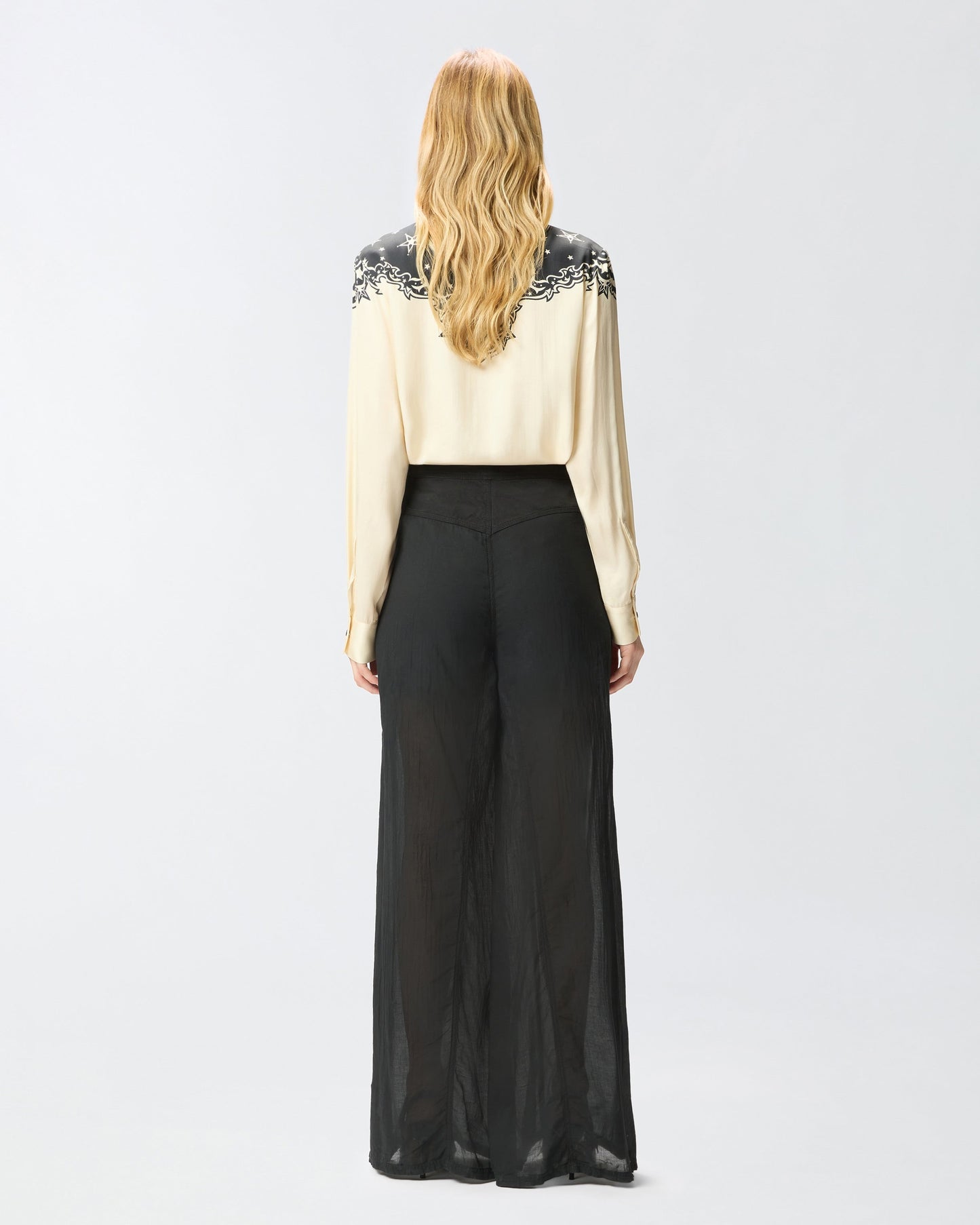 Lightweight trousers with laces and Texan details