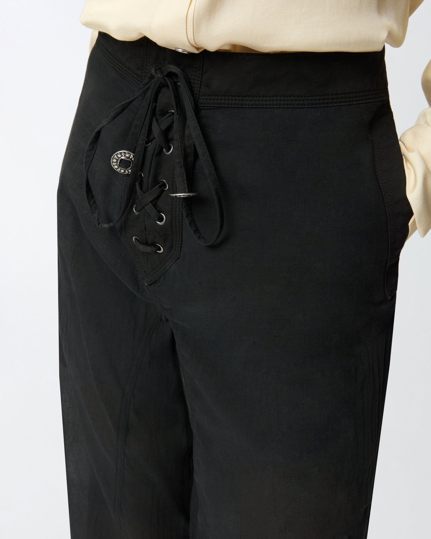 Lightweight trousers with laces and Texan details