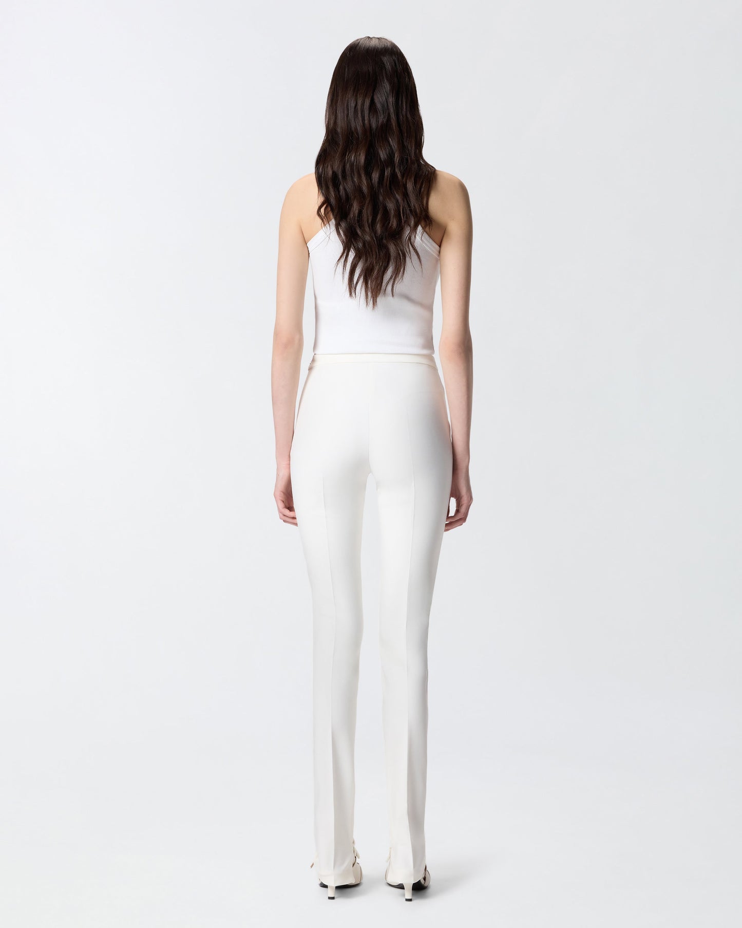 Trousers with adjustable hem slit detail
