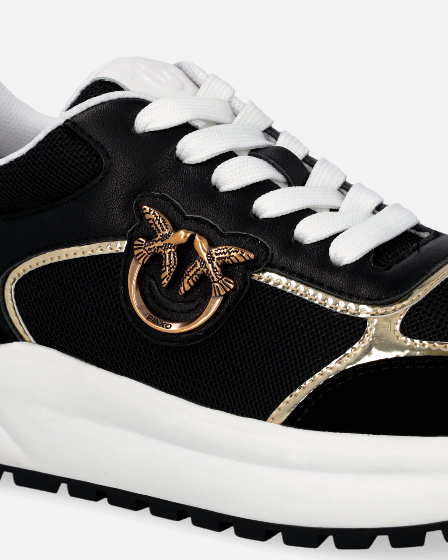 Sneakers with logo and mirror-finish details